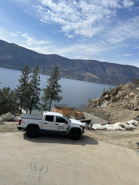 Quality Air Care truck at a lakeview home under construction in the Okanagan