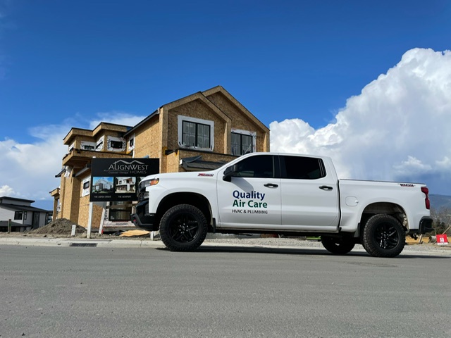 Quality Air Care truck parked at a new construction home in the Okanagan